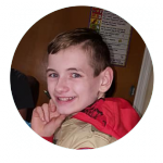 a boy in a boy scouts uniform